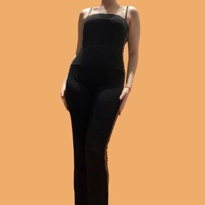 Glam jumpsuit that makes you look like a Radio City Rockette;)